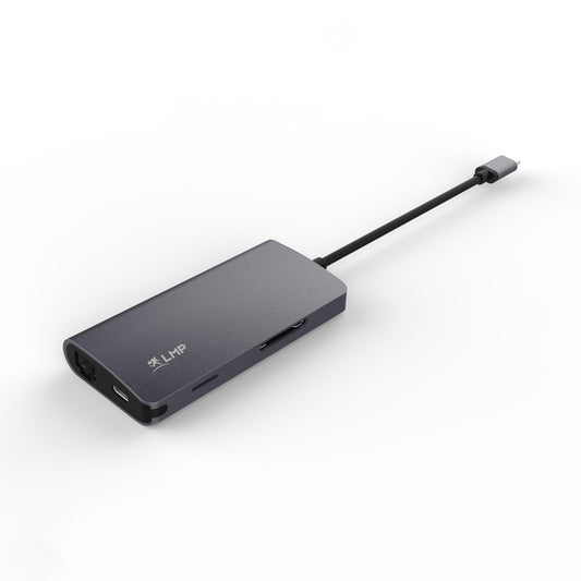 Das LMP USB-C mini Dock space grau von LMP ist ein schlanker, rechteckiger Adapter mit mehreren Anschlüssen, einschließlich HDMI 4K. Er verfügt über ein schwarzes Kabel und das LMP-Logo auf der Oberseite, das vor einem weißen Hintergrund abgebildet ist - ideal für die Verbindung mit dem MacBook Pro.