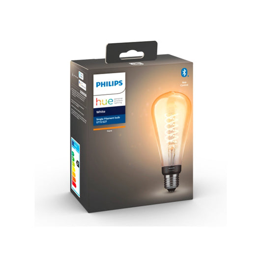 Eine Philips Hue White Filament Giant Edison smarte LED-Lampe E27 von Philips in ihrer Verpackung mit einer leuchtenden Glühbirne im Vintage-Stil und einem Bluetooth-Symbol für die drahtlose Verbindung.