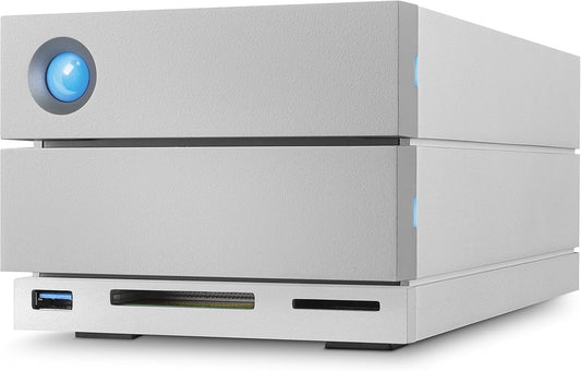 A close-up of the LaCie 2big Dock Thunderbolt 3 Hardware RAID, 8TB features a sleek silver design with a blue LED button, USB port, and SD card slots—ideal for iPad storage expansion or wireless file sharing.