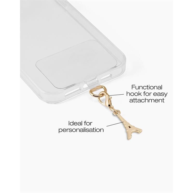 Verleihen Sie Ihrem Smartphone mit dem „Ideal of Sweden Anhänger Eiffelturm – Gold“ einen Hauch von Eleganz und Funktionalität. Dieses transparente Handyhüllen-Accessoire verfügt über einen schicken goldenen Eiffelturm-Anhänger von Ideal of Sweden, der über einen praktischen Haken befestigt wird – perfekt zur individuellen Gestaltung. Inspiriert von den stilvollen Designs von Ideal of Sweden verleiht dieser Handy-Anhänger Ihrem Smartphone sowohl Raffinesse als auch praktischen Nutzen.