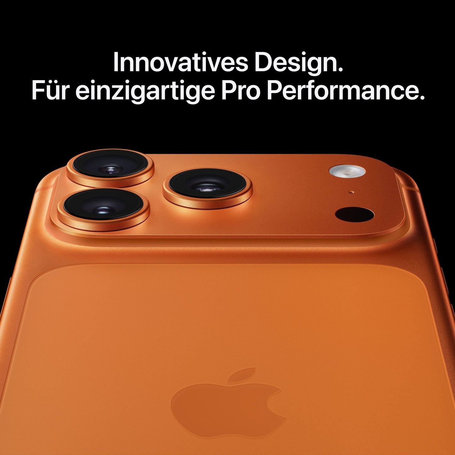 Close-up of the Apple iPhone 17 Pro 512GB in Cosmic Orange with triple cameras, 48MP rear camera, and flash against a black background. German text above: Innovatives Design. Für einzigartige Pro Performance.