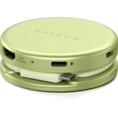 Der Satechi OntheGo 5-in-1-Multiport-Adapter (Citrus) von Satechi ist ein runder, hellgrüner Adapter mit sichtbaren HDMI-, USB-C- und weiteren Anschlüssen. Er verfügt über ein integriertes Kabel, das sich ordentlich um den Sockel wickeln lässt. Dieser kompakte und effiziente Multiport-Adapter ist ideal für alle, die eine tragbare Lösung für die Arbeit oder auf Reisen suchen.