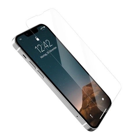 A Woodcessories Asahi Glass 2.5D screen protector is applied to an iPhone 14 Plus or 13 Pro Max at an angle, showing the time 12:42 and a mountain wallpaper on the lock screen.