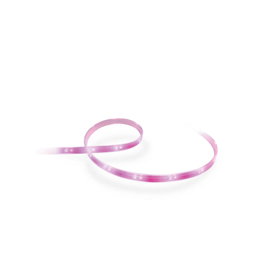 Der Philips Hue LightStrip Plus, Verlängerung 1m von Philips bildet eine sanfte Kurve auf weißem Hintergrund und strahlt ein weiches Licht aus - eine flexible Lichtquelle, die sich ideal für subtile Akzentbeleuchtung eignet.