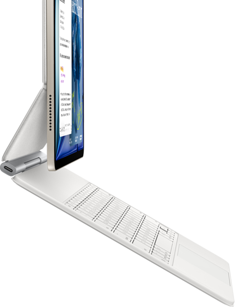 iPad Air, Farbe Polarstern, befestigt am Magic Keyboard, Weiß, Seitenansicht